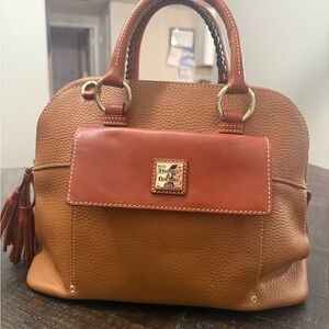 Dooney & Bourke Brown and Tan Leather Dome Satchel
13x6x11
LxWxH